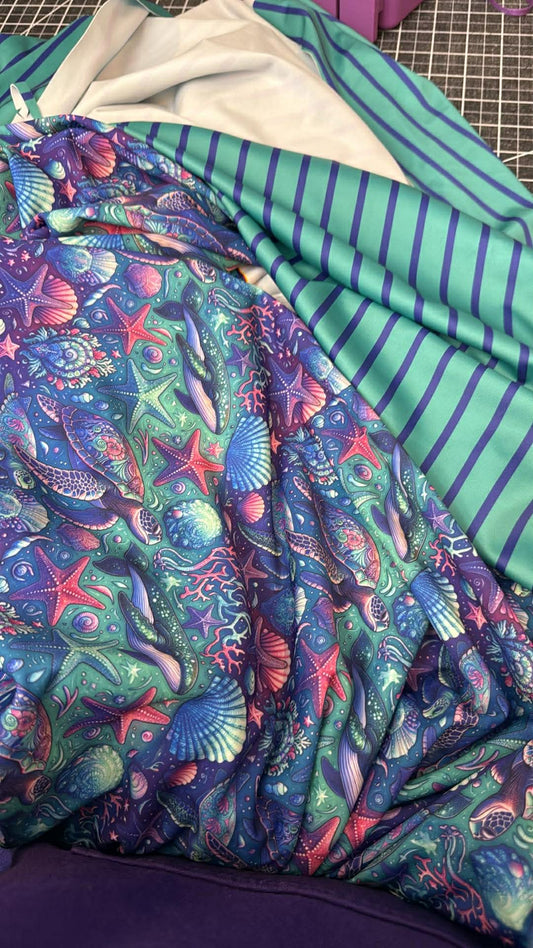 ACC Swim - Rashguard plus low rise swim bottoms with flutters